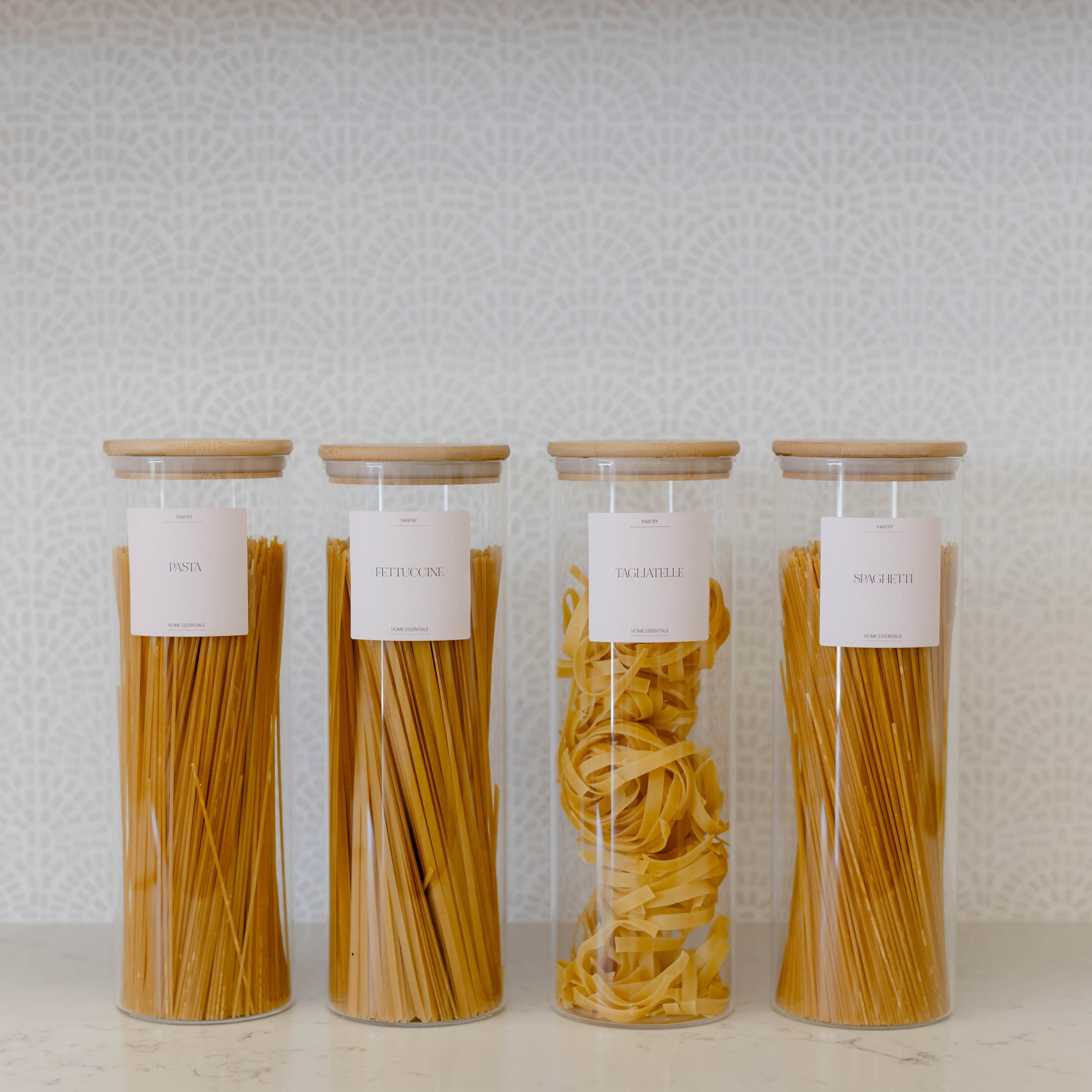 Stylish and functional 1.6L spaghetti jar by Pretty Little Designs, perfect for organizing long pasta varieties on a kitchen shelf.