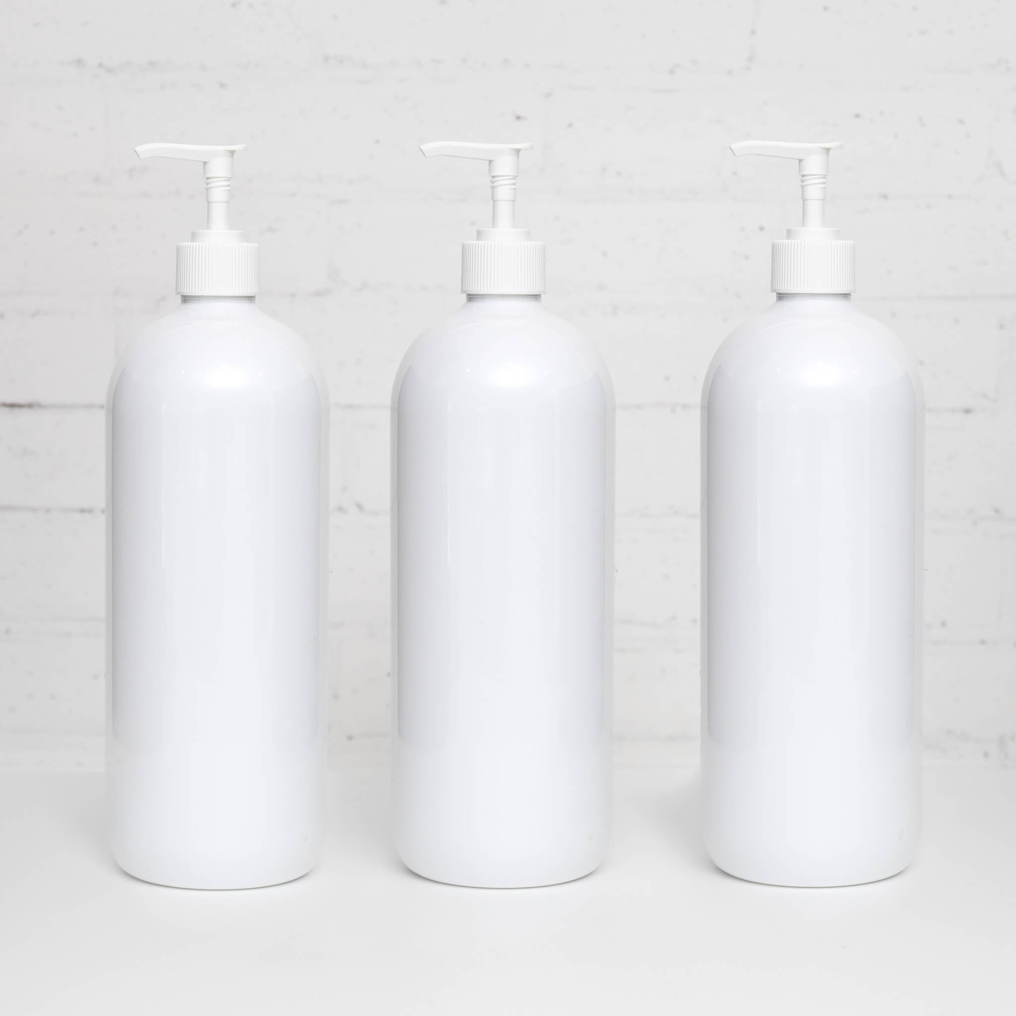 1L white plastic pump bottle front view