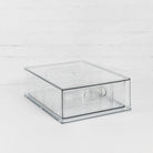 Collection of medium modular storage drawers in various configurations.