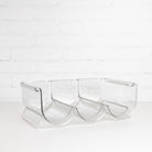 Stackable wine holder designed to maximise fridge space.