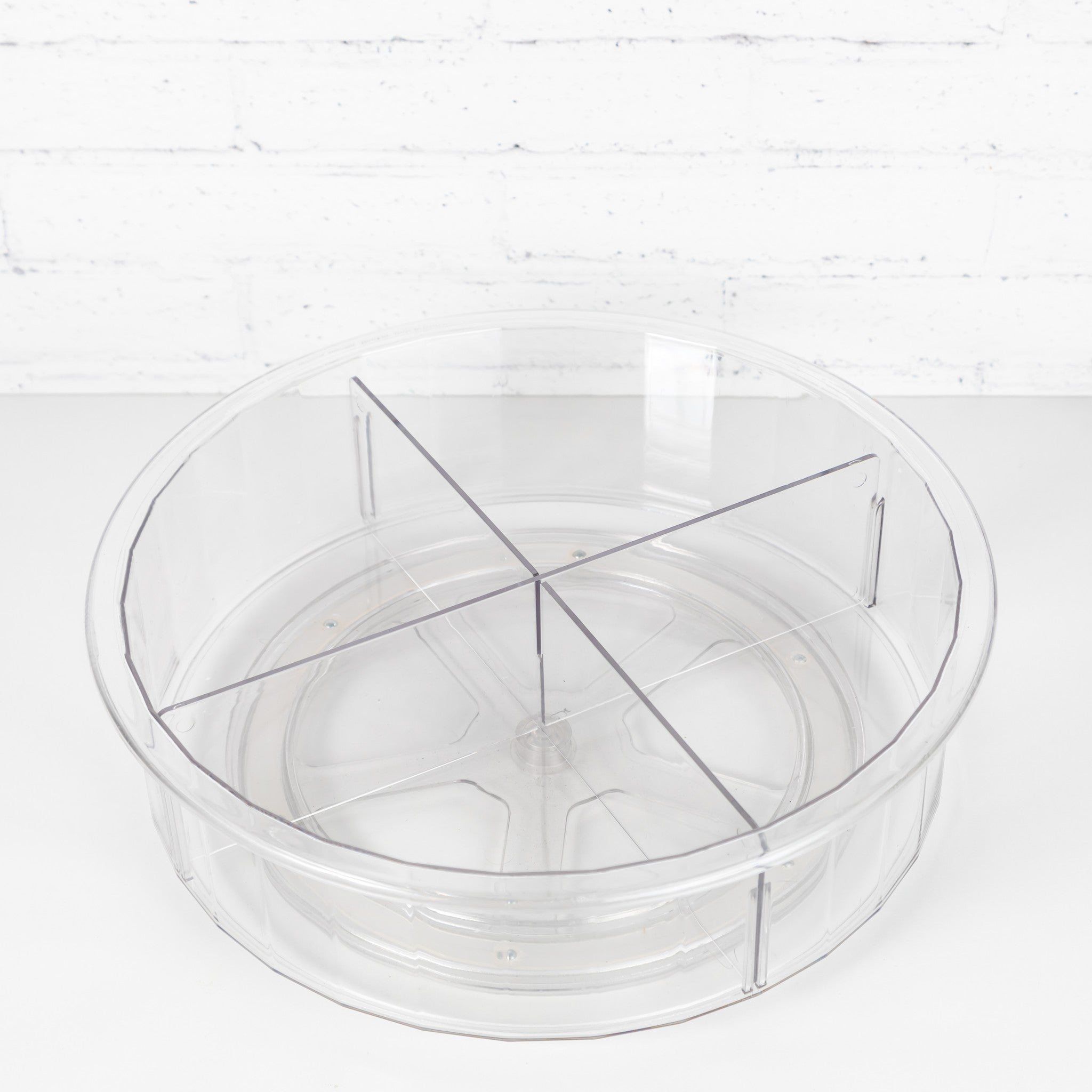 Smooth turning mechanism of the Crystal Lazy Susan for easy access to items.
