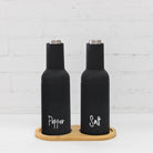 Black Gravity Salt & Pepper Grinders – Sleek and stylish mills with a gravity mechanism for effortless seasoning.