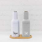 Stylish White Salt & Pepper Mills – Modern gravity grinders with a clean, white finish for a chic kitchen look.