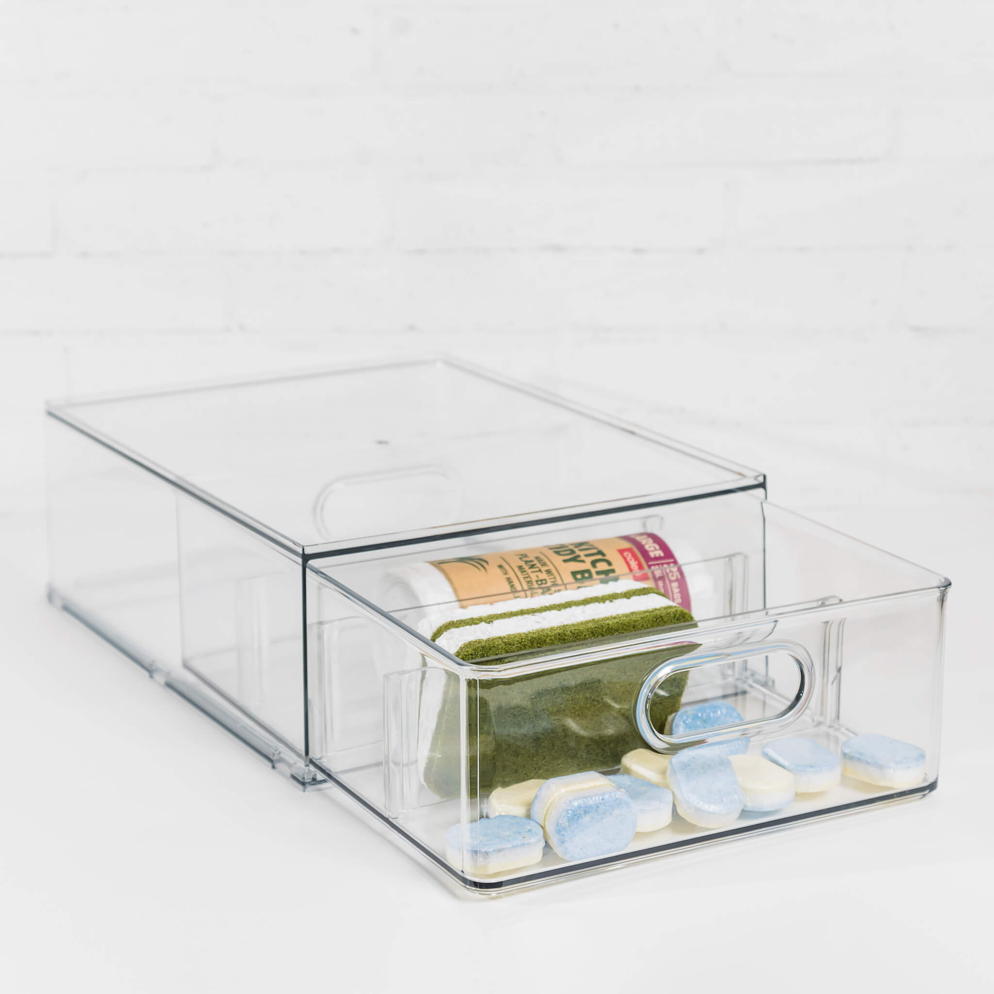 Clear medium modular storage drawer showcasing its spacious interior.