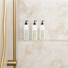 Reusable bathroom label stickers on tall pump bottles