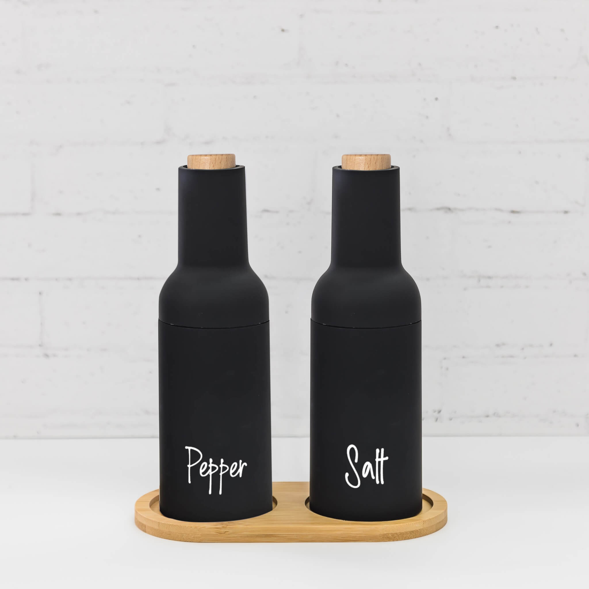 Stylish Black Gravity Salt & Pepper Grinders – High-quality design with gravity operation for precise seasoning.