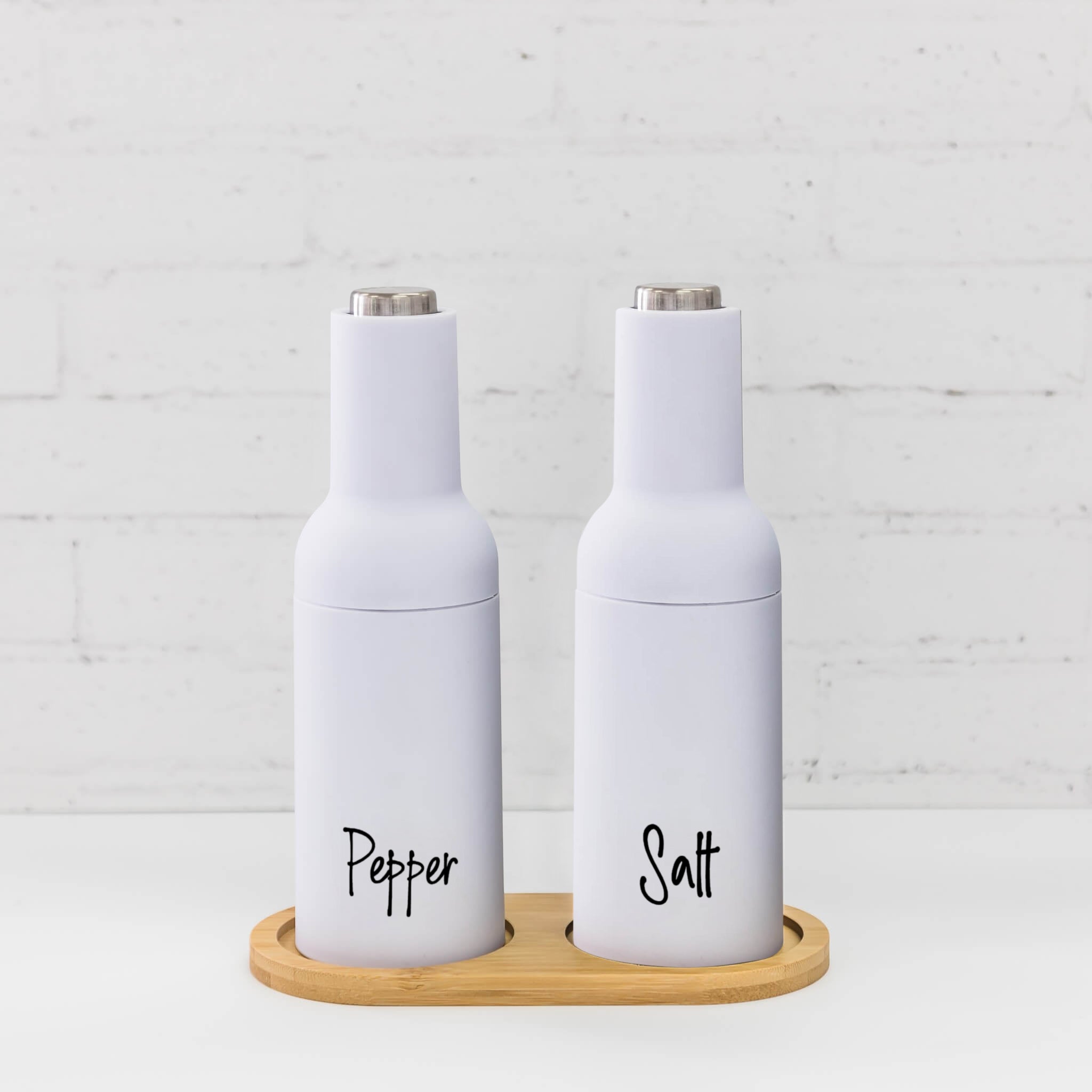 White Gravity Salt & Pepper Grinders – Sleek design with gravity operation for easy, hands-free seasoning.