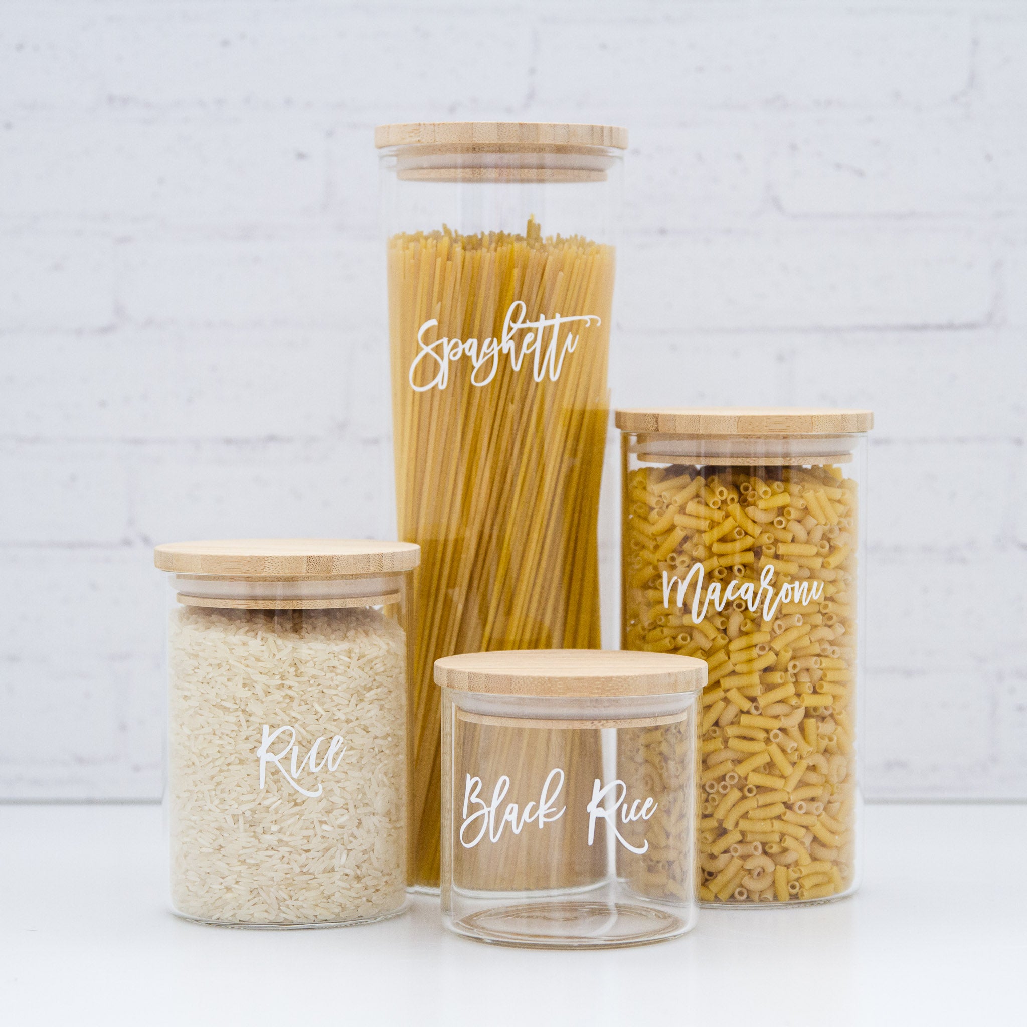 4 glass jar canisters with a bamboo lid