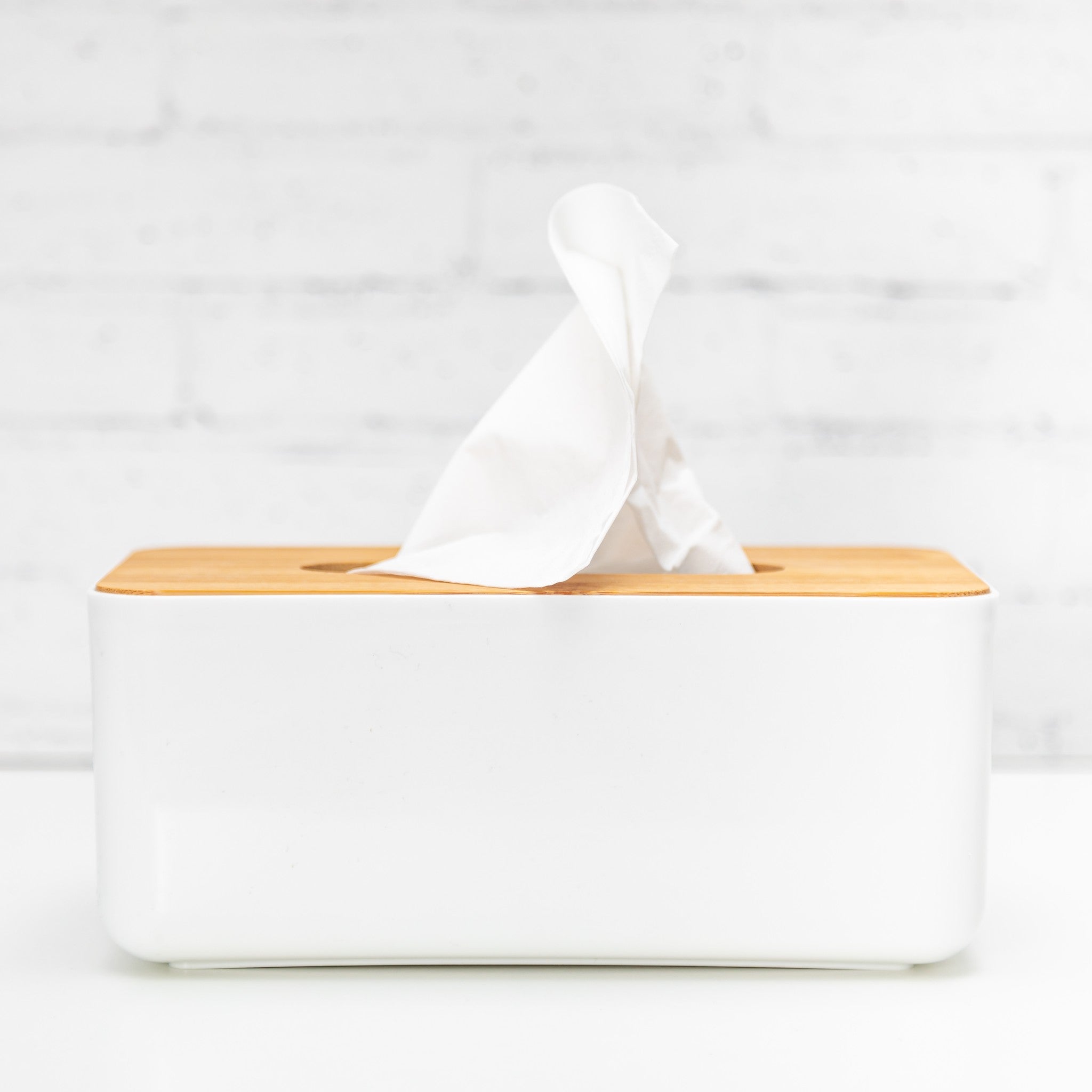 Elegant bamboo tissue box holder that complements bathroom décor.