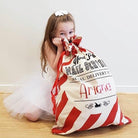 Durable candy stripe Santa sack for holding Christmas gifts and treats.