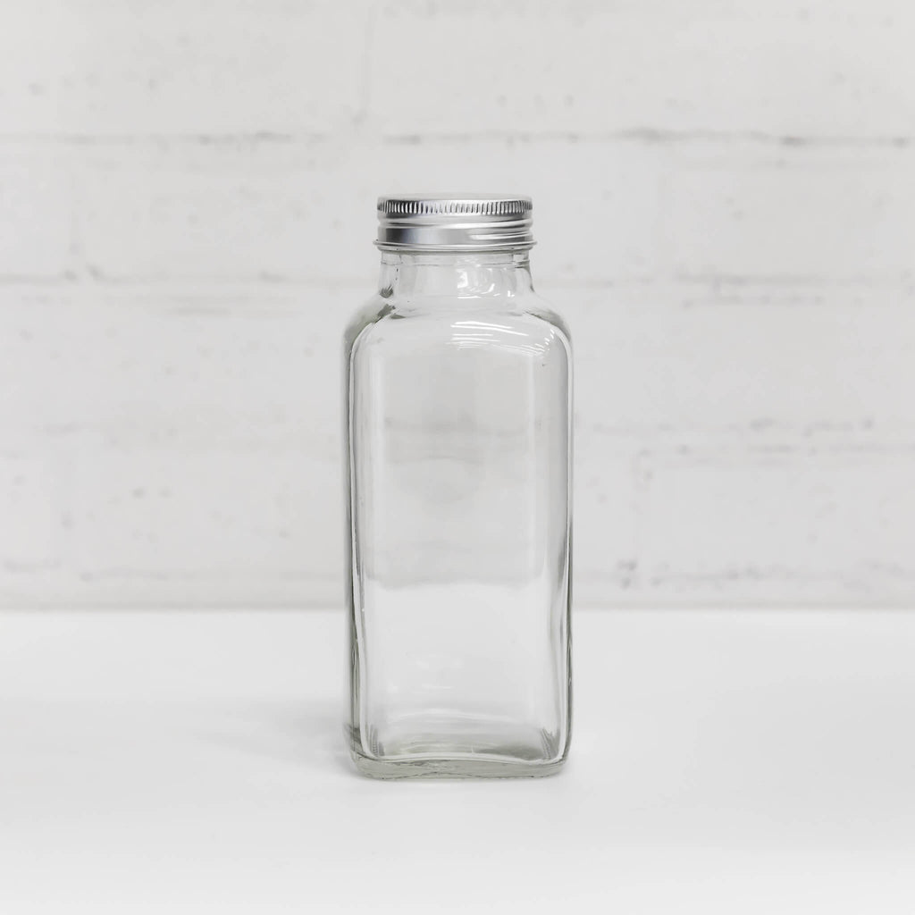 Clear glass spice container with shaker lid
