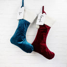 Customisable velvet Santa stocking designed for festive gift storage.
