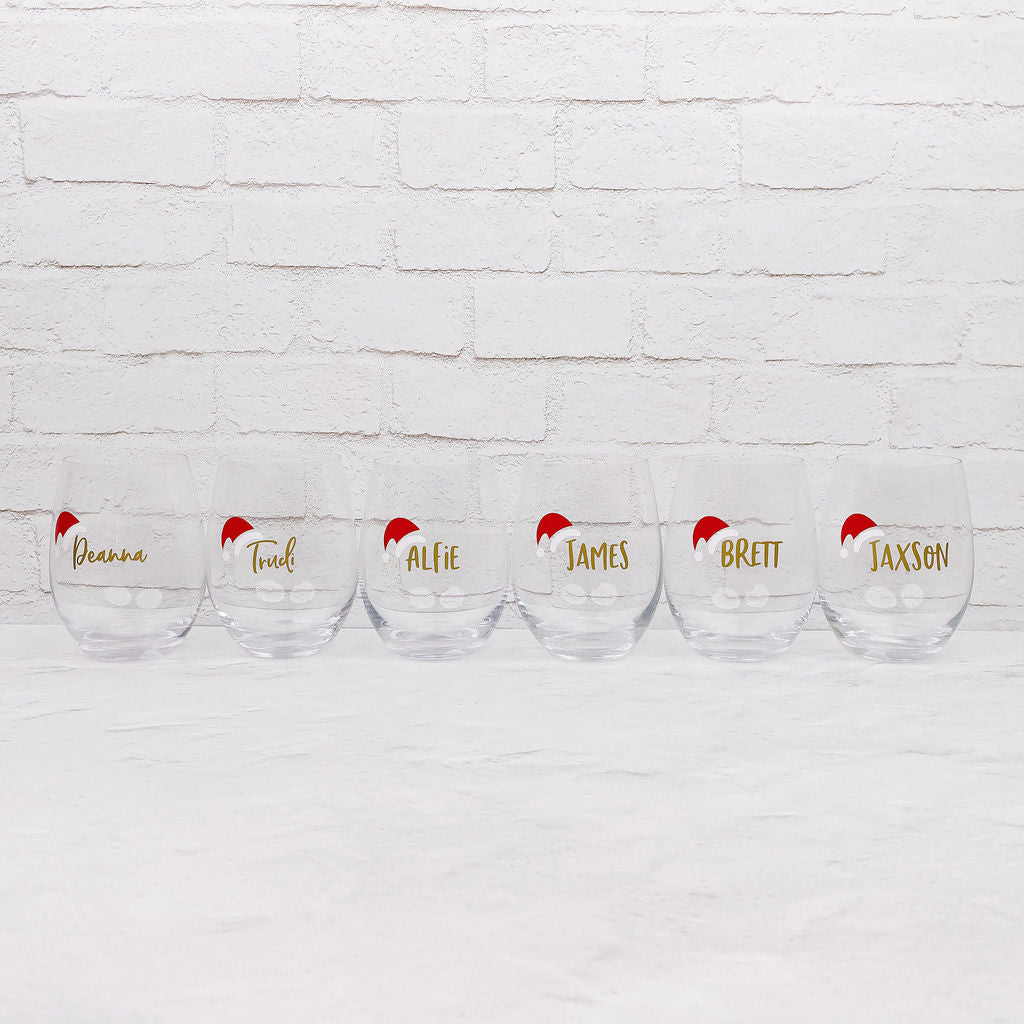 Display of personalised Santa's name label stickers, perfect for adding a unique touch to Christmas gifts.