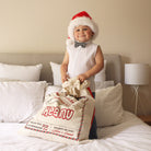 Reusable personalised Santa sack as an eco-friendly alternative to wrapping paper.