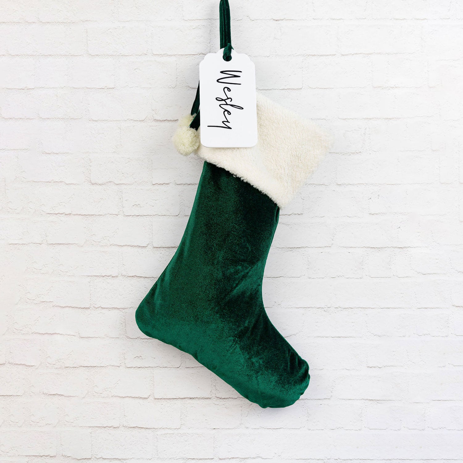 Display of velvet Santa stockings, ideal for creating holiday traditions.