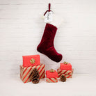 Velvet Santa stocking displayed in a festive setting, enhancing holiday décor.