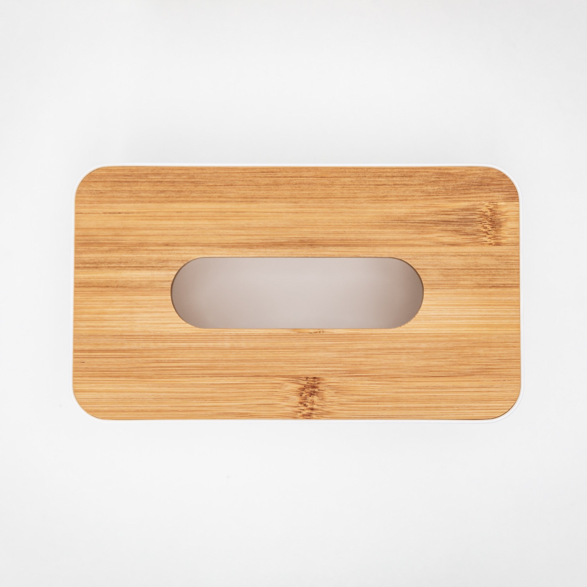 Modern tissue box design featuring a natural bamboo lid for stylish organisation.