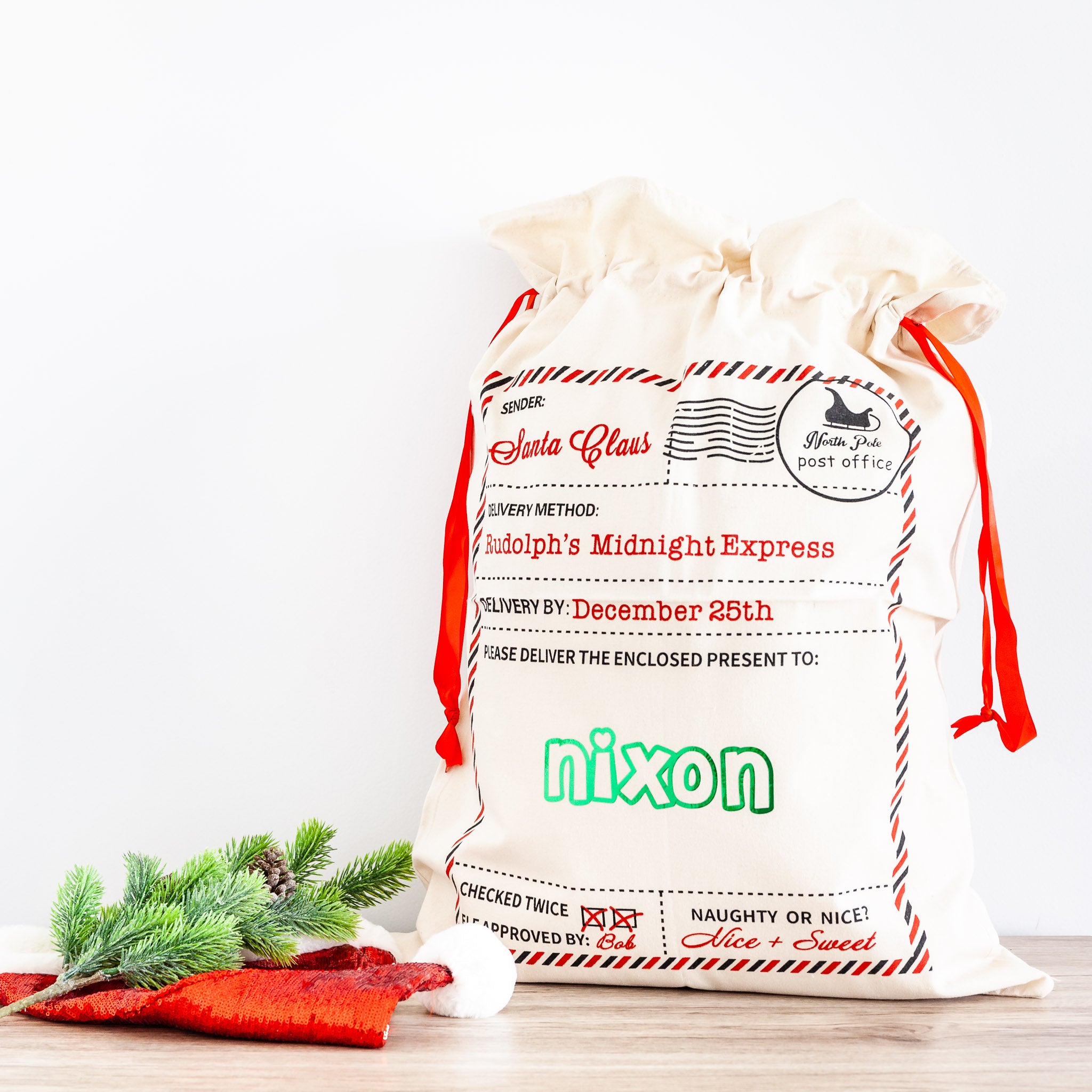 Personalised Rudolph's Midnight Express Santa sack for storing Christmas gifts.